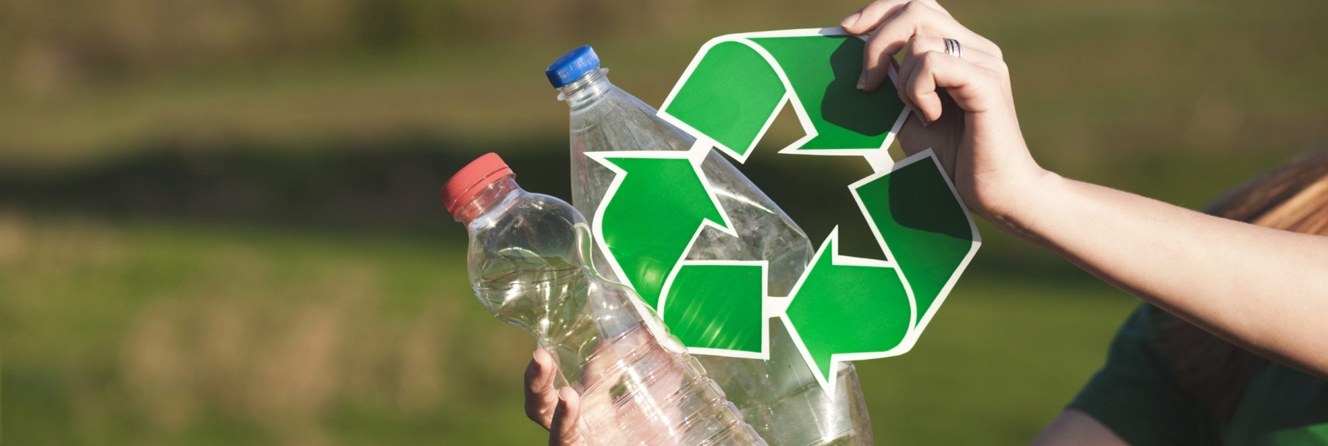 recycle-background-with-woman-holding-recycle-sign
